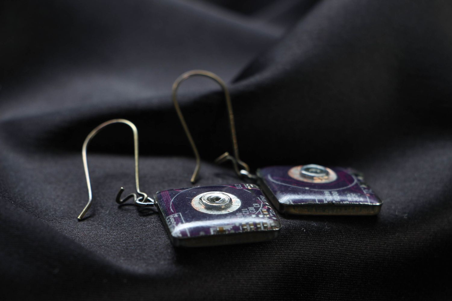 Beautiful metal earrings with microchips photo 2