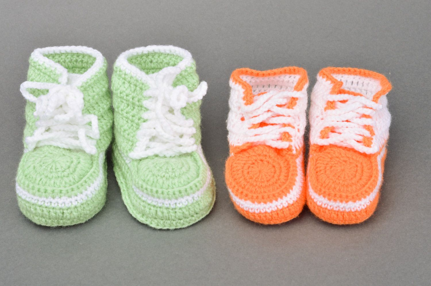 A set of handmade crocheted baby booties two pairs of light green and orange colors photo 2
