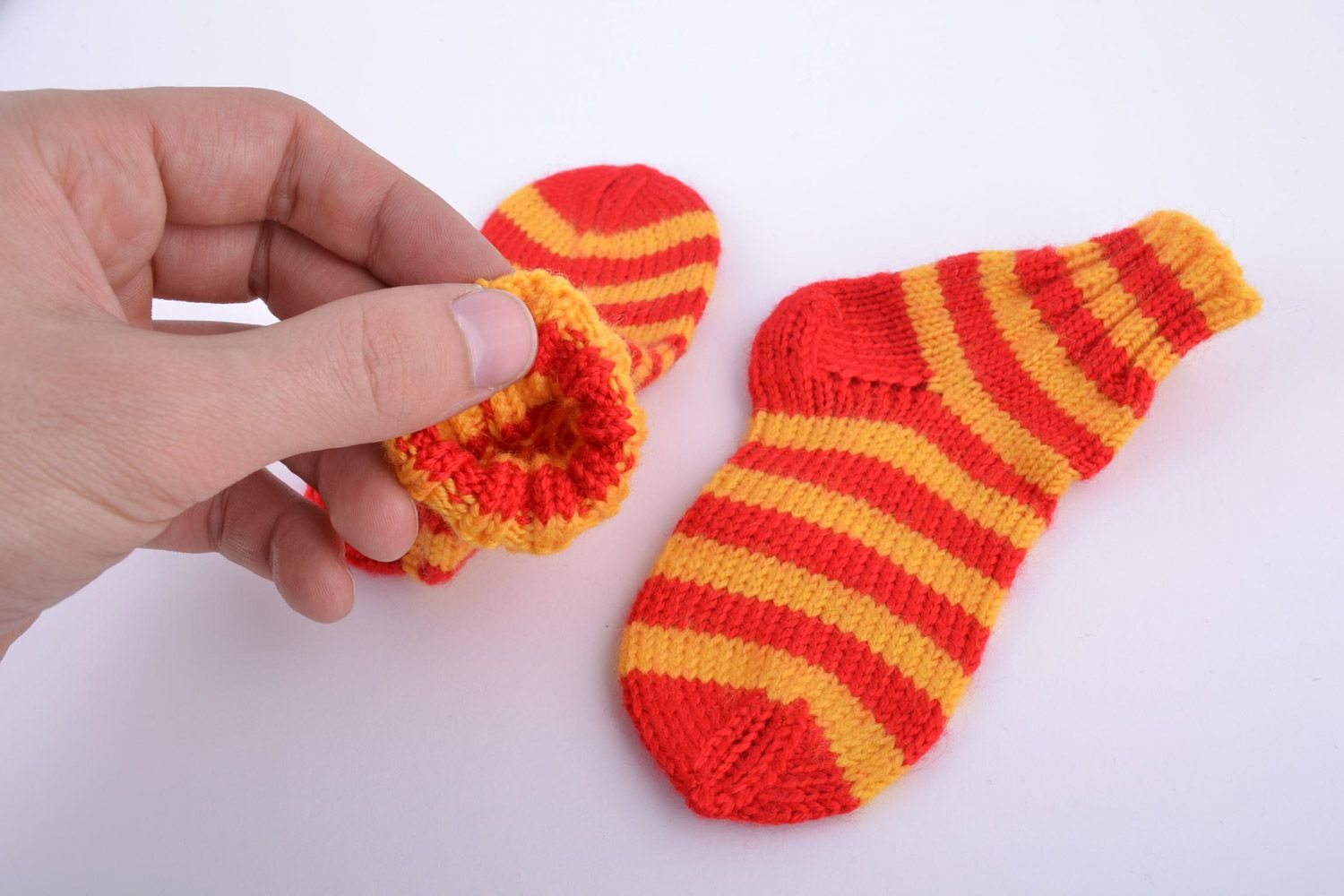 Yellow and red striped handmade baby socks knitted of semi-woolen threads photo 2
