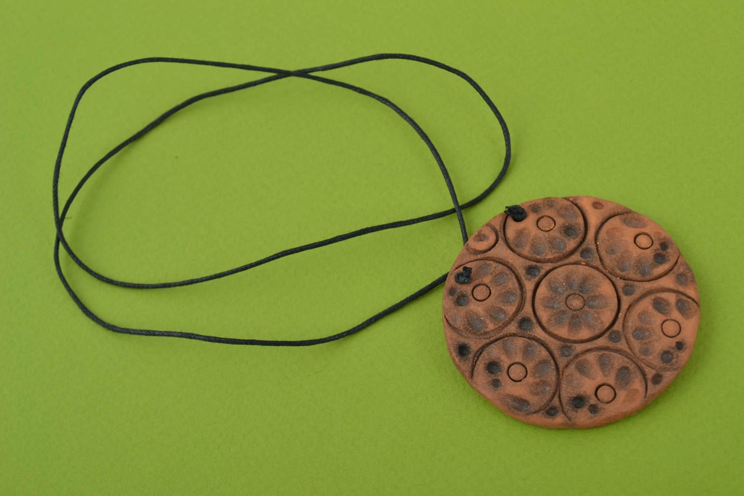 Clay beautiful ethnic handmade pendant of round shape  photo 1