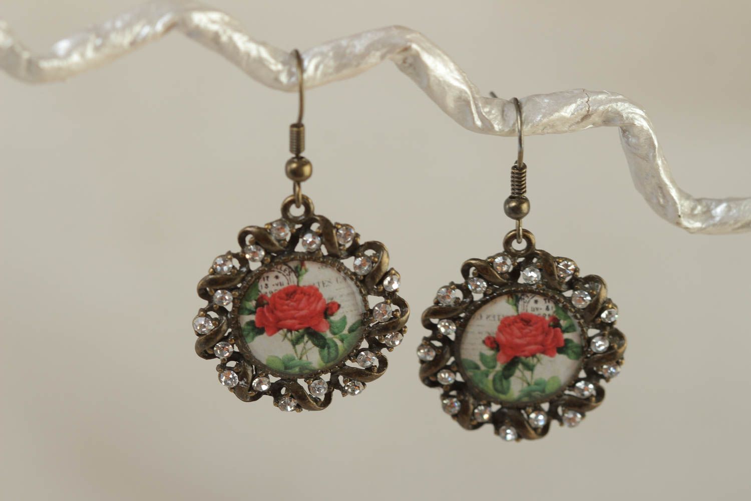 Handmade stylish earrings made of glassy glaze and metal with beads in vintage style photo 1