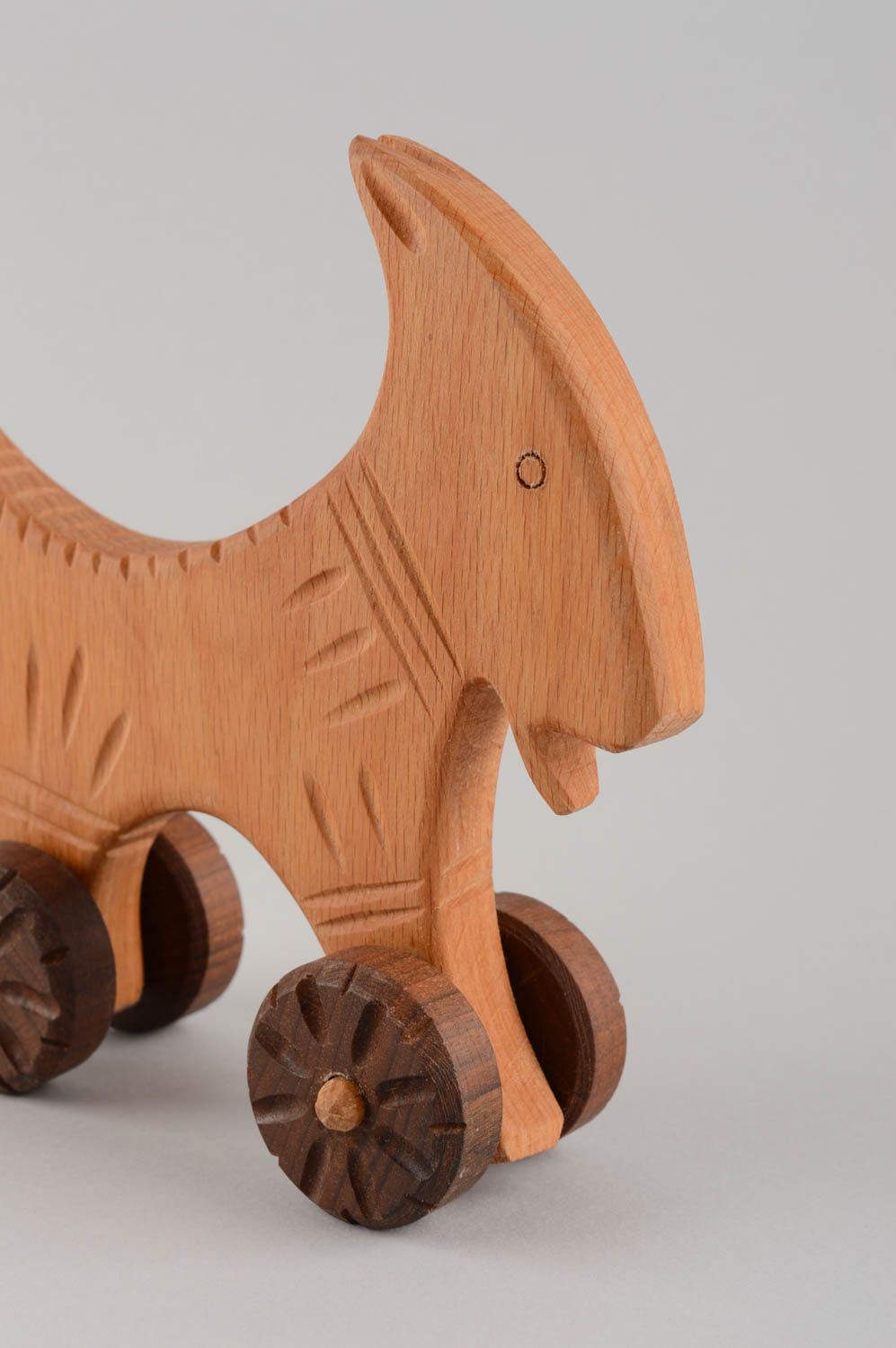 Eco friendly handmade wooden wheeled toy goat for children photo 5