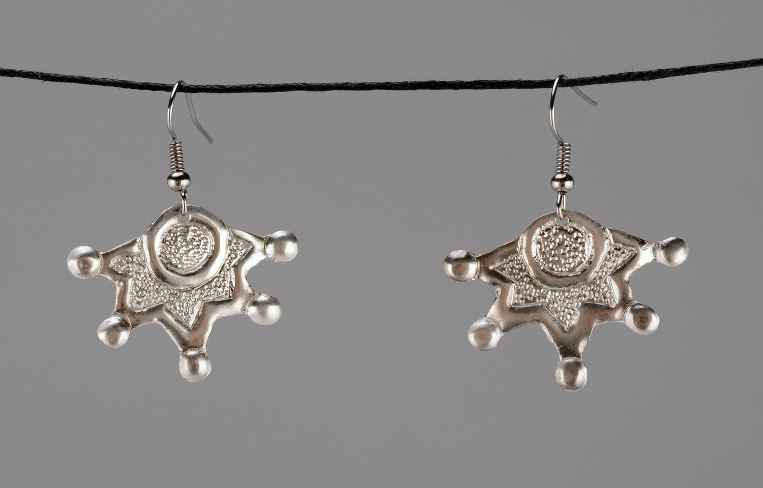 Metal earrings with silver-plating photo 1