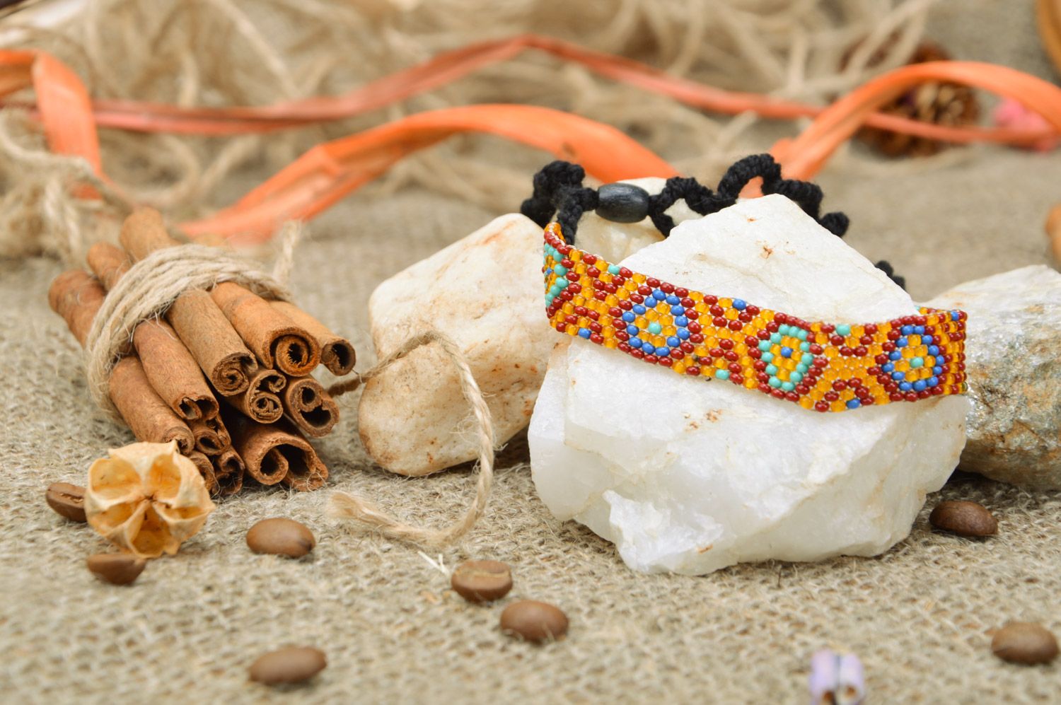 Handmade orange wrist bracelet woven of Czech beads with geometric ornament photo 1