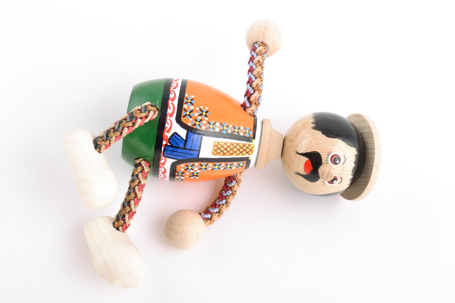 Homemade painted wooden eco toy in the shape of man in Ukrainian costume photo 5