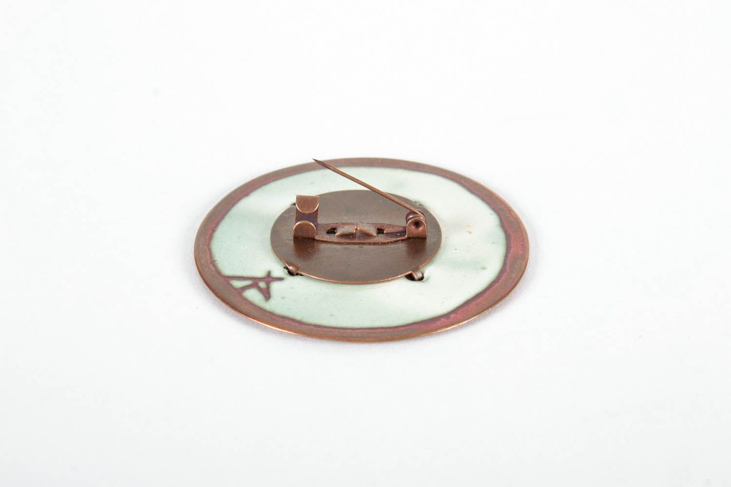Copper brooch decorated with hot enameling photo 2