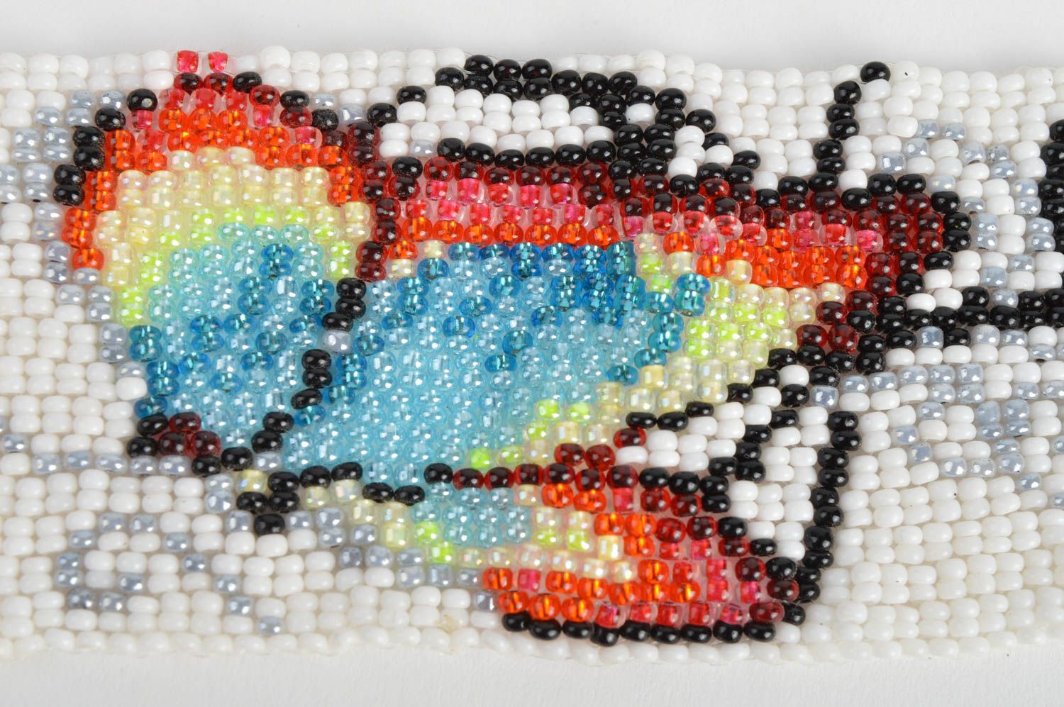 Bracelet en perles de rocaille blanc image de papillon multicolore fait main photo 4