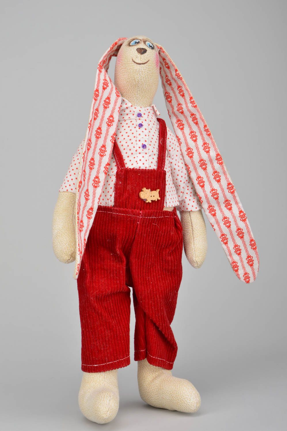 Handmade designer cotton fabric soft toy rabbit boy in red trousers and shirt photo 1