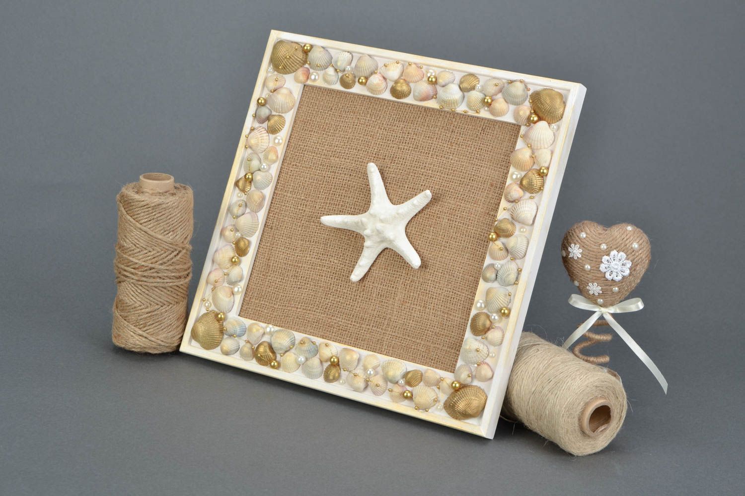 Handmade beautiful designer interior picture with natural seashells and starfish photo 1