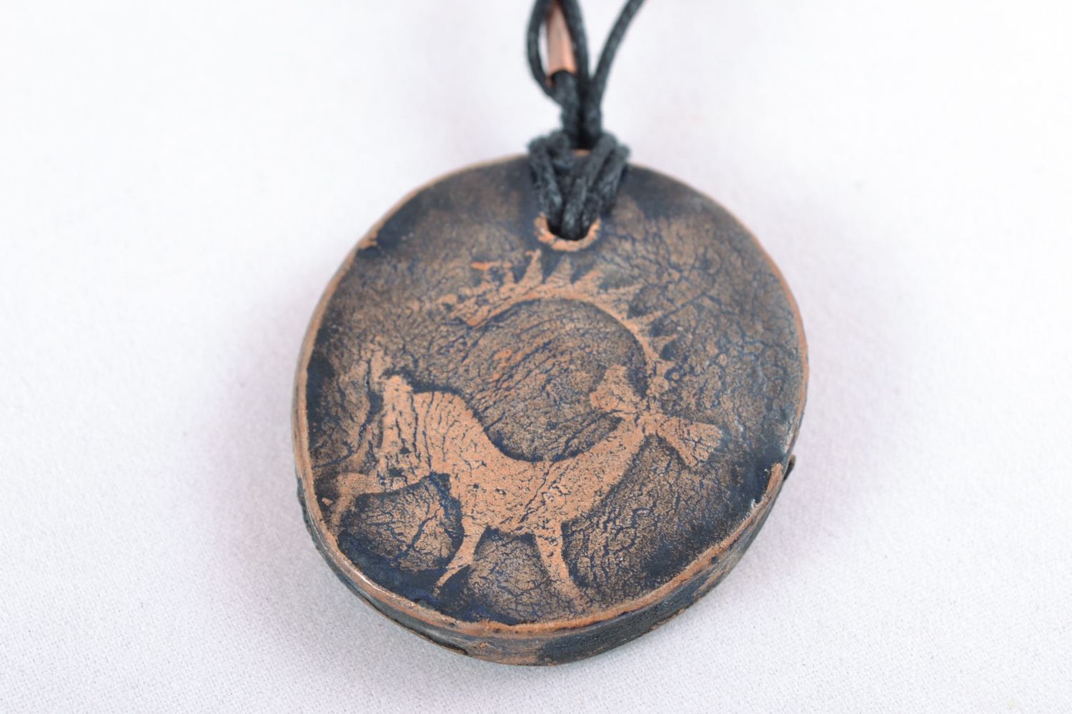 Clay pendant in ethic style with ornament with deer photo 3