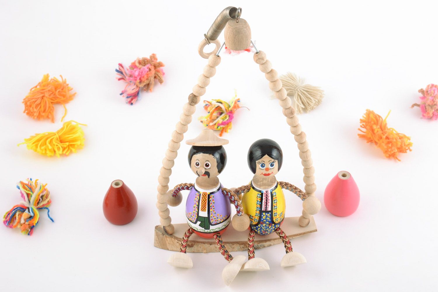 Öko Spielzeug aus Holz auf Sprungfeder mit Bemalung Liebespaar Handarbeit  foto 1