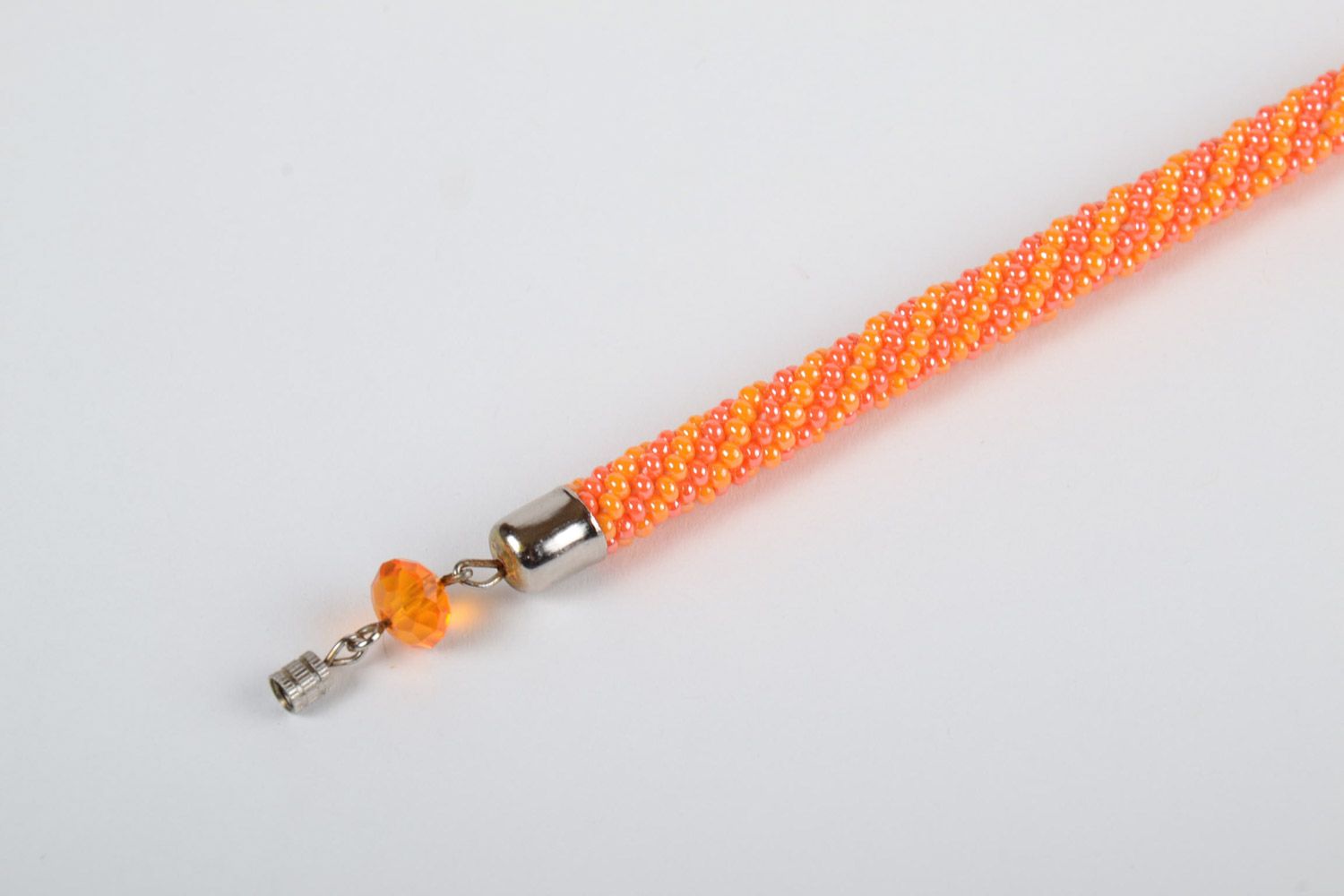 Handmade female bright beautiful designer beaded cord bracelet in orange color photo 3