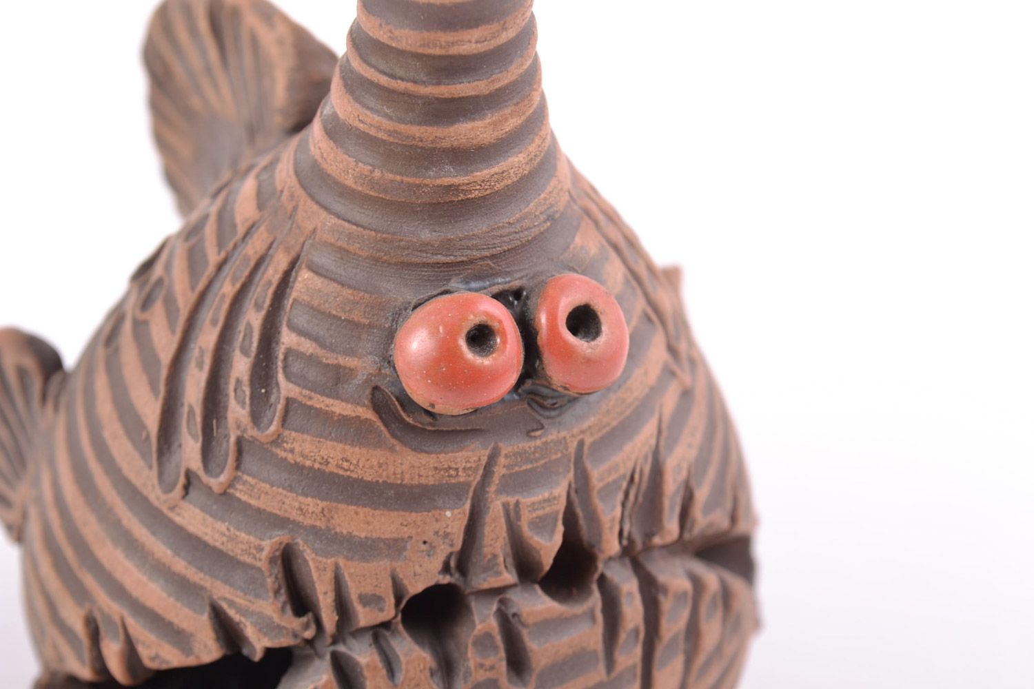 Handmade ceramic souvenir figurine of fish of brown color kilned with milk photo 2