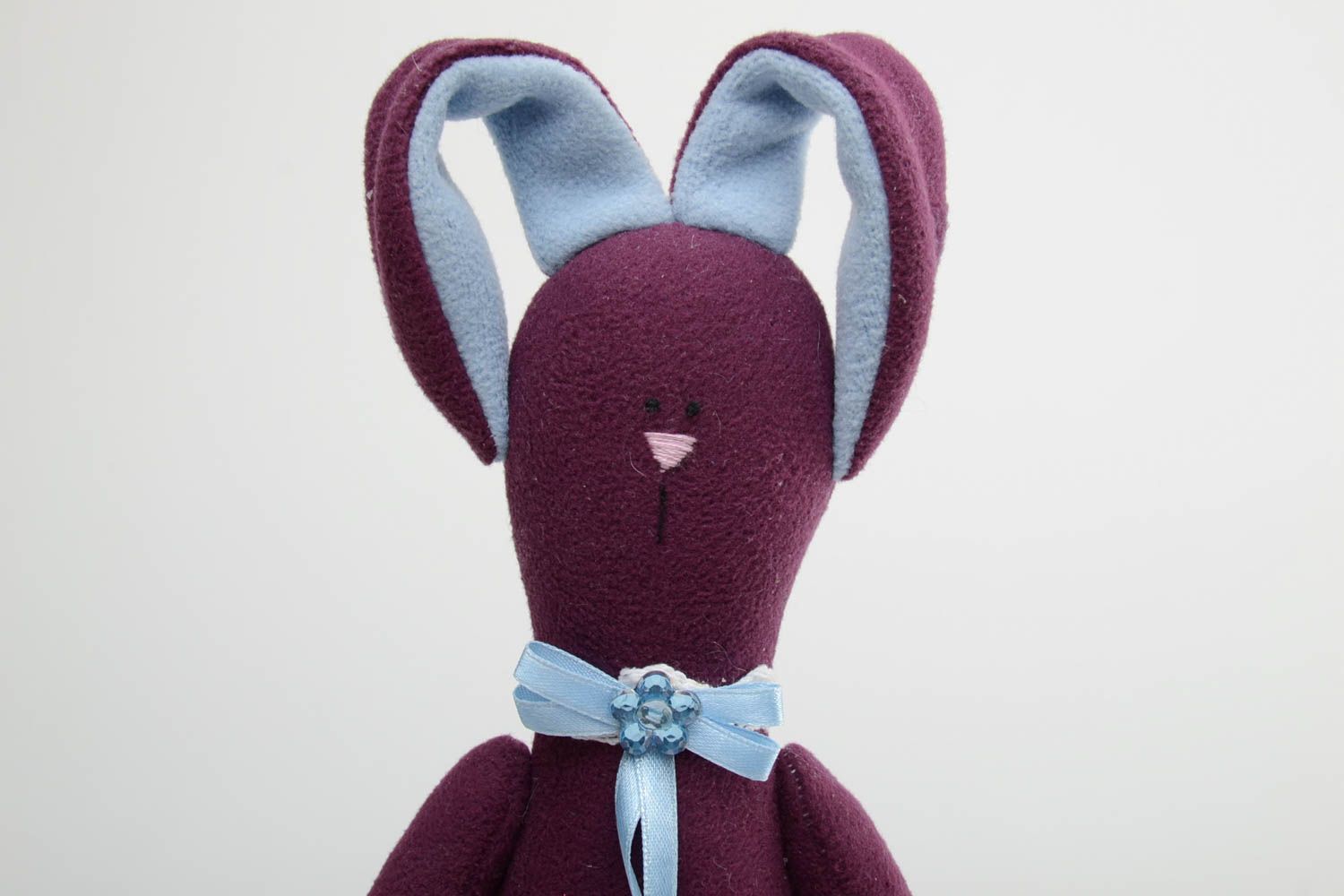 Handmade designer soft toy sewn of fleece violet rabbit with long ears photo 3