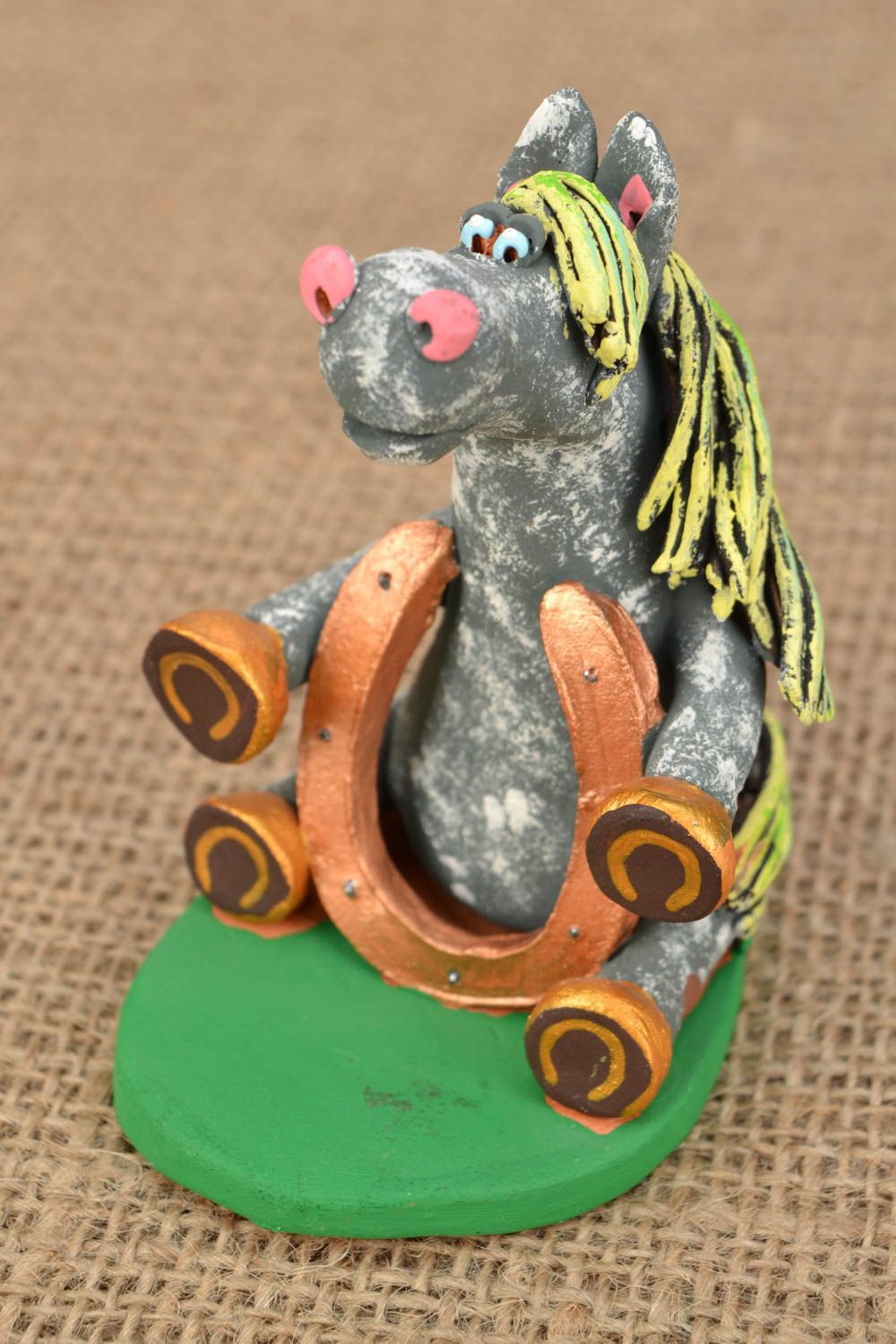 Homemade clay figurine Horse with a Horseshoe photo 1