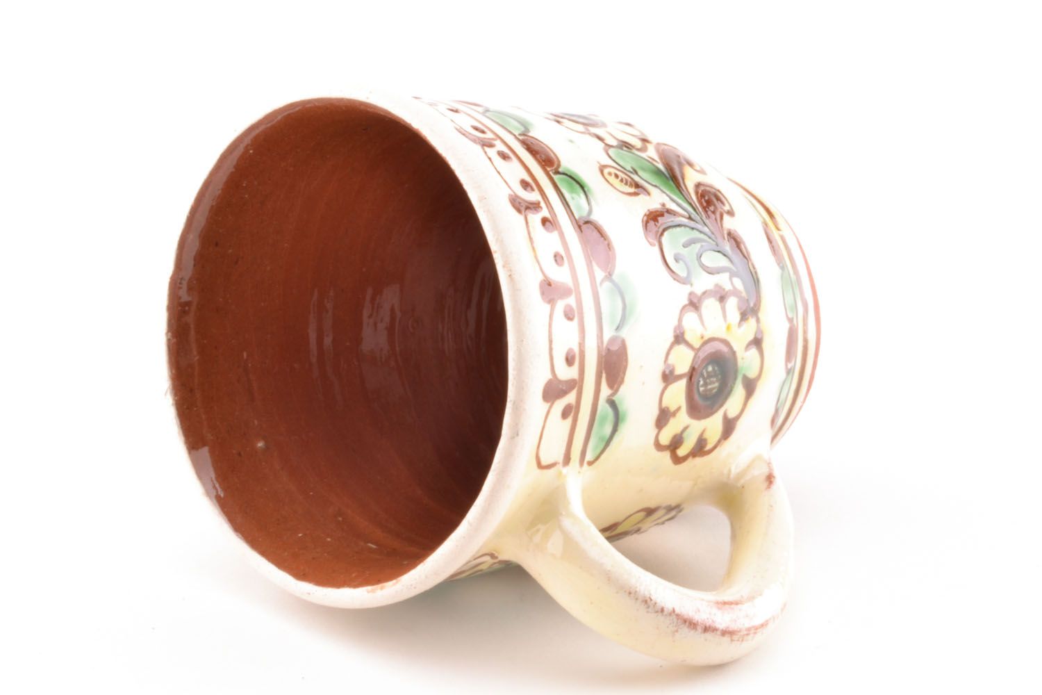 Decorative clay glazed cup in beige, cherry, and green colors with handle photo 4