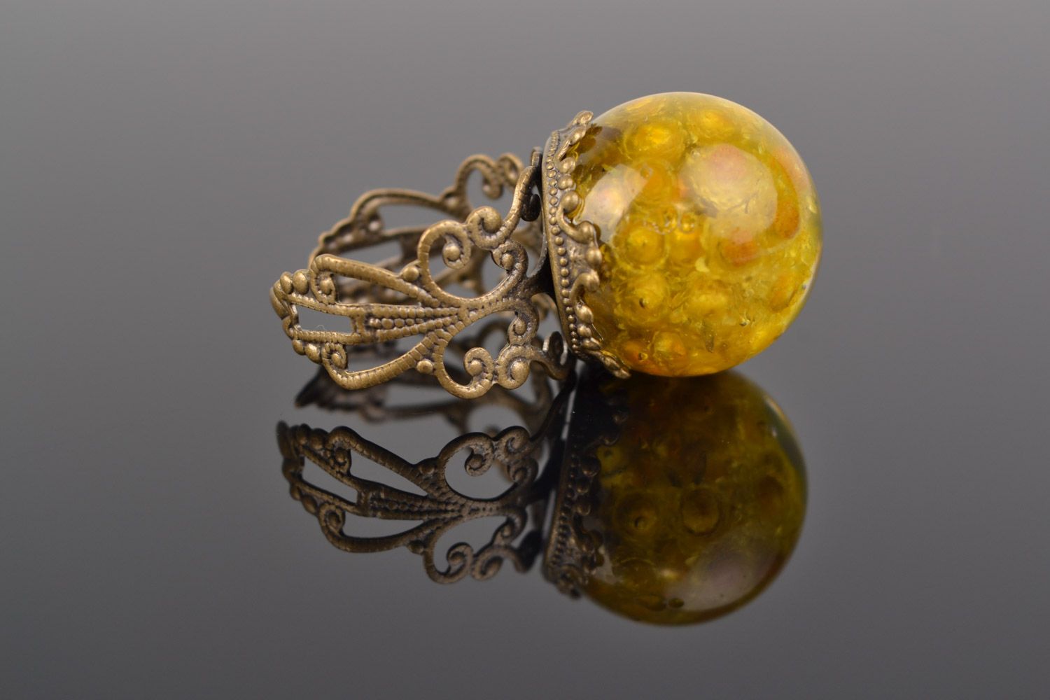 Handmade yellow ring with real helichrysum flower coated with epoxy photo 1