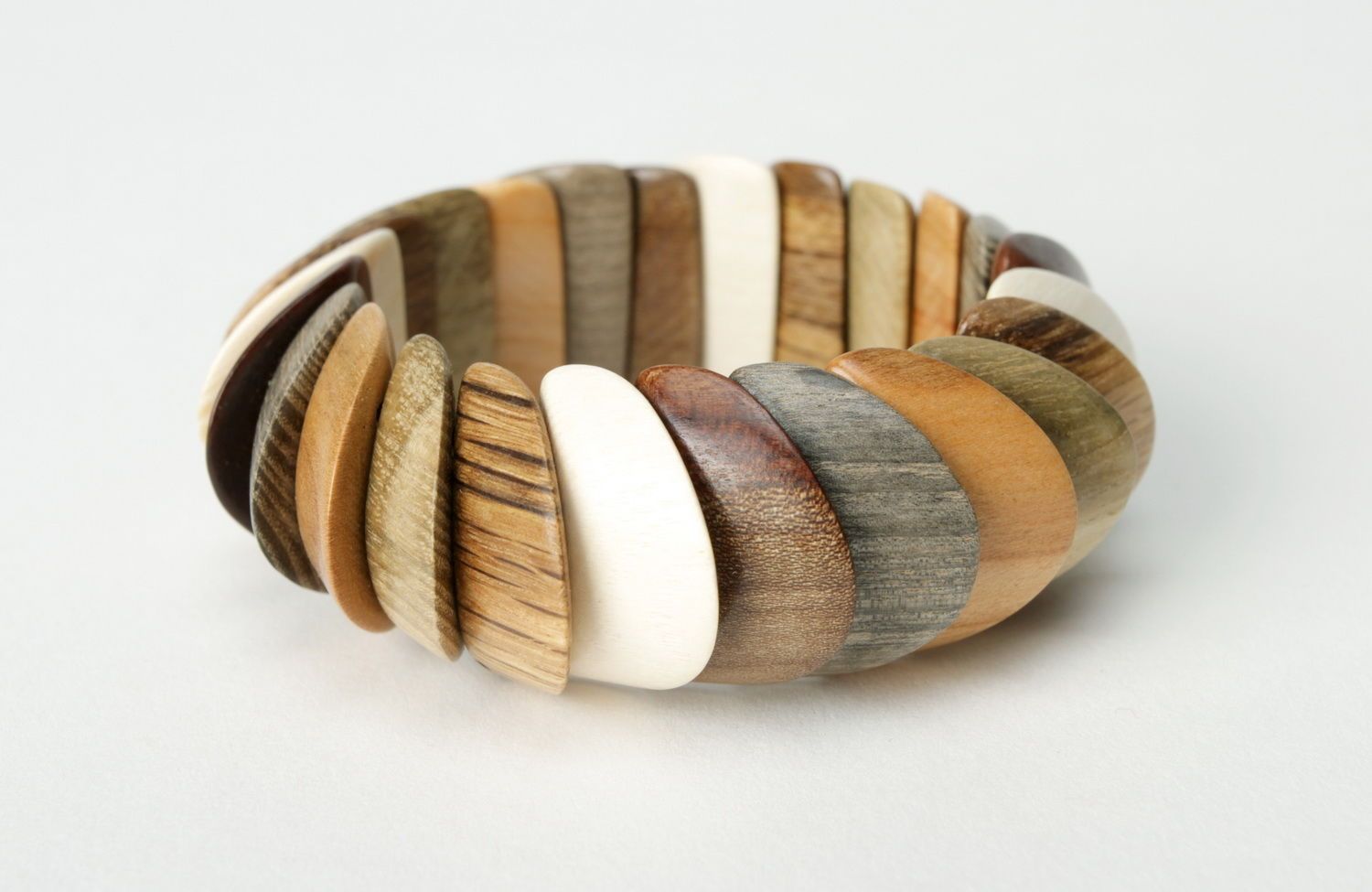 Wrist bracelet made of different wood species photo 1