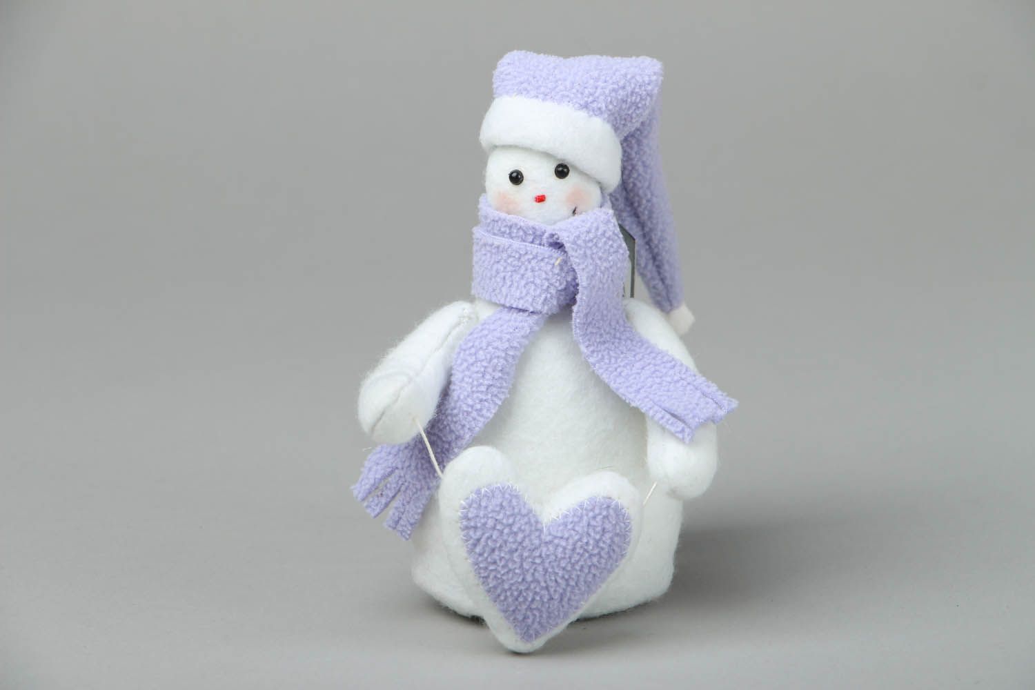 Felt snowman with a heart photo 1