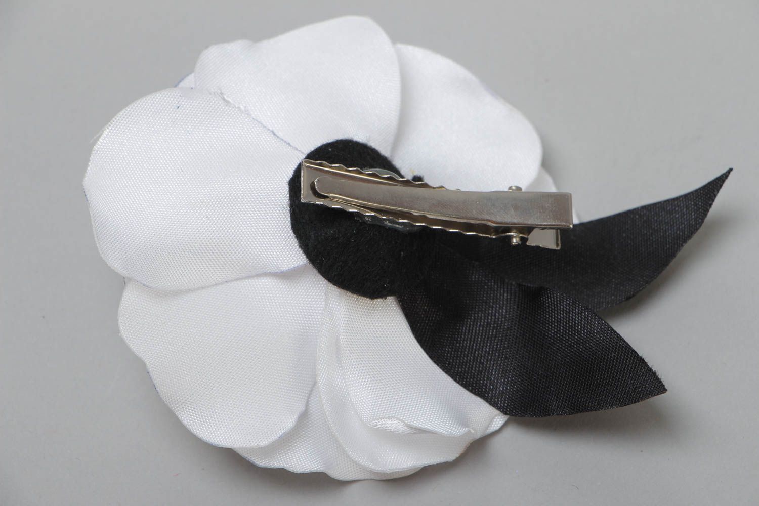 Handmade hair clip with volume white satin rose flower with black leaves photo 4