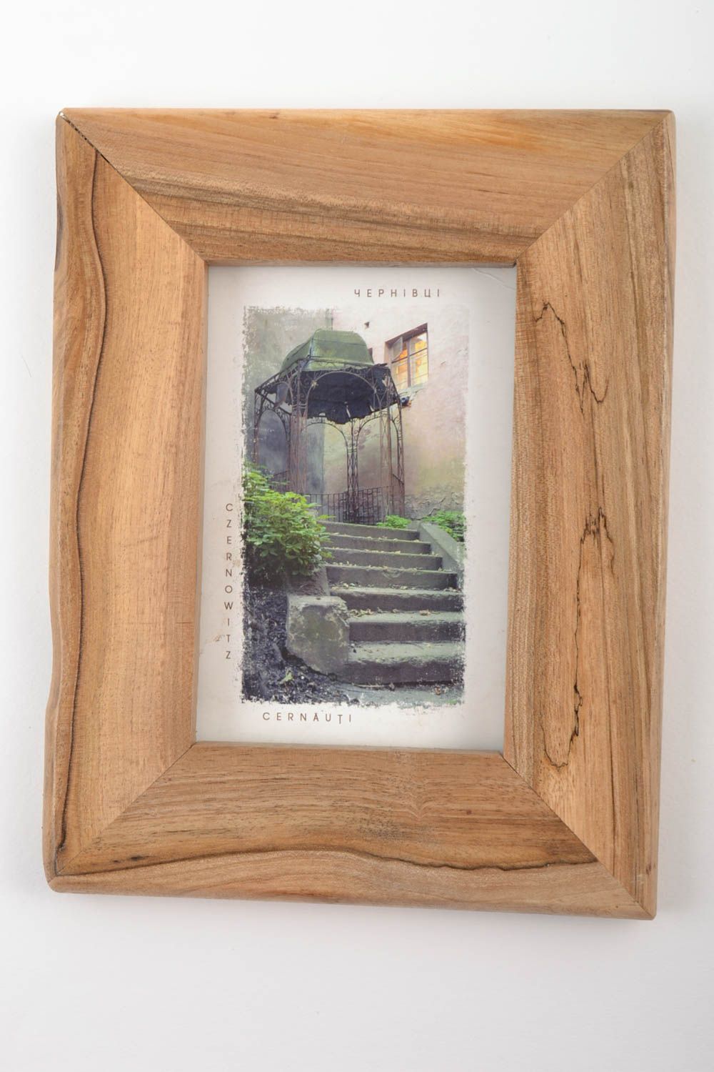 Wooden cute handmade lacquered beautiful frame for photo in eco style photo 1