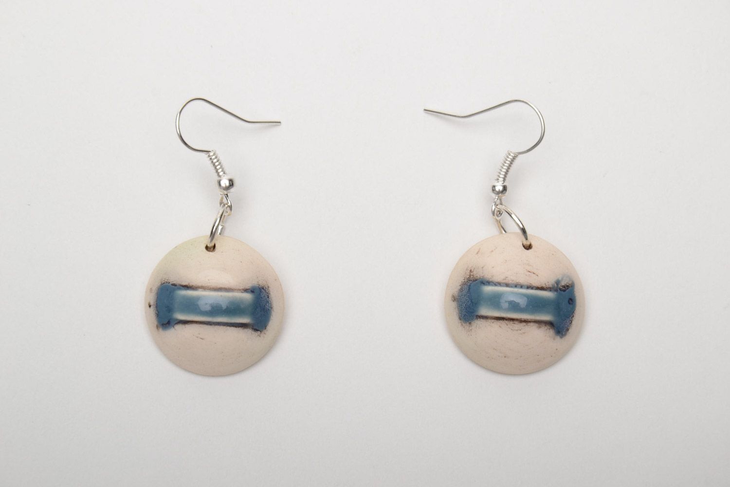 Handmade laconic beige round dangle ceramic earrings painted with enamels photo 5