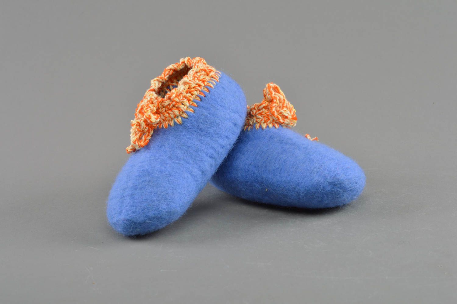 Handmade bright blue felted woolen baby booties with crocheted over edges photo 1