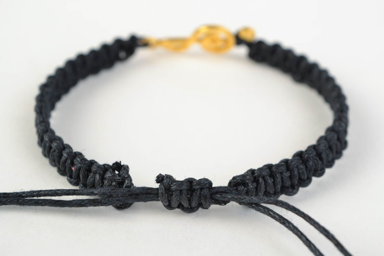 Handmade stylish bracelet made of cotton cord black with metal charm photo 4