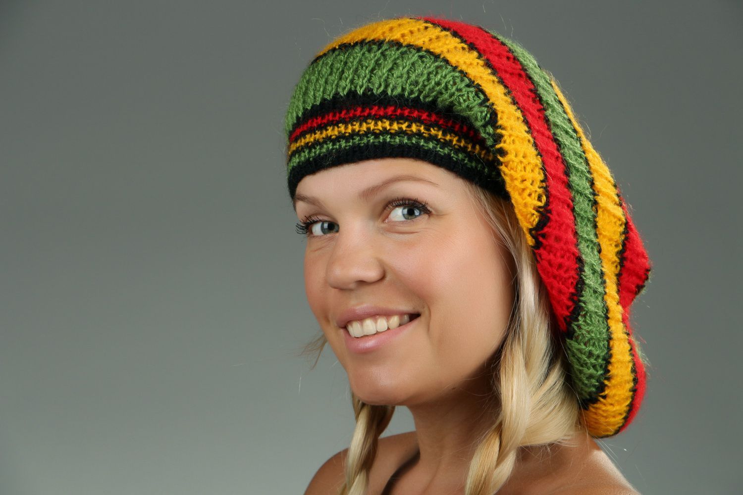 American knitted beret with bright sripes photo 1