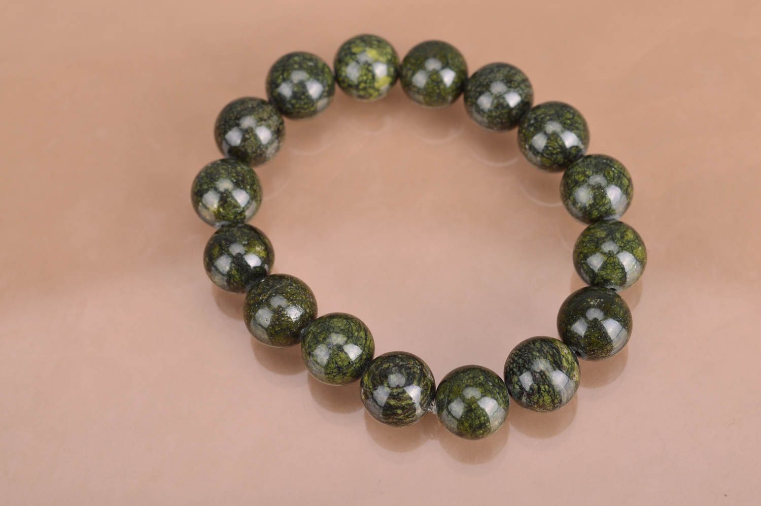 Designer handmade wrist women's bracelet with beads of moss green color photo 5