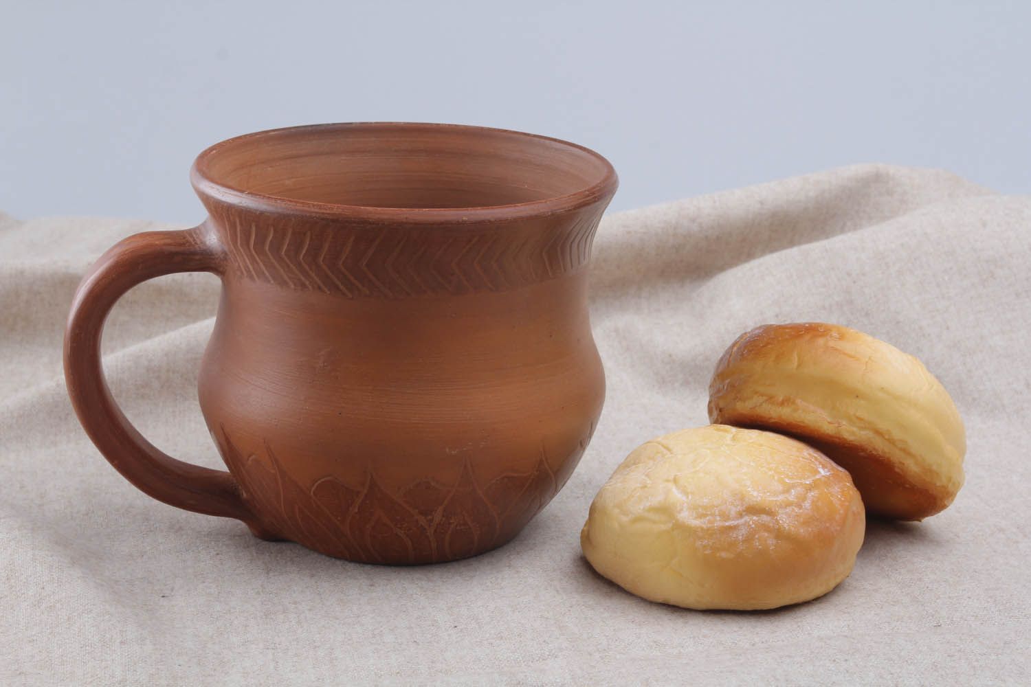 Terracotta color Mexican style clay cup with handle and rustic pattern photo 1
