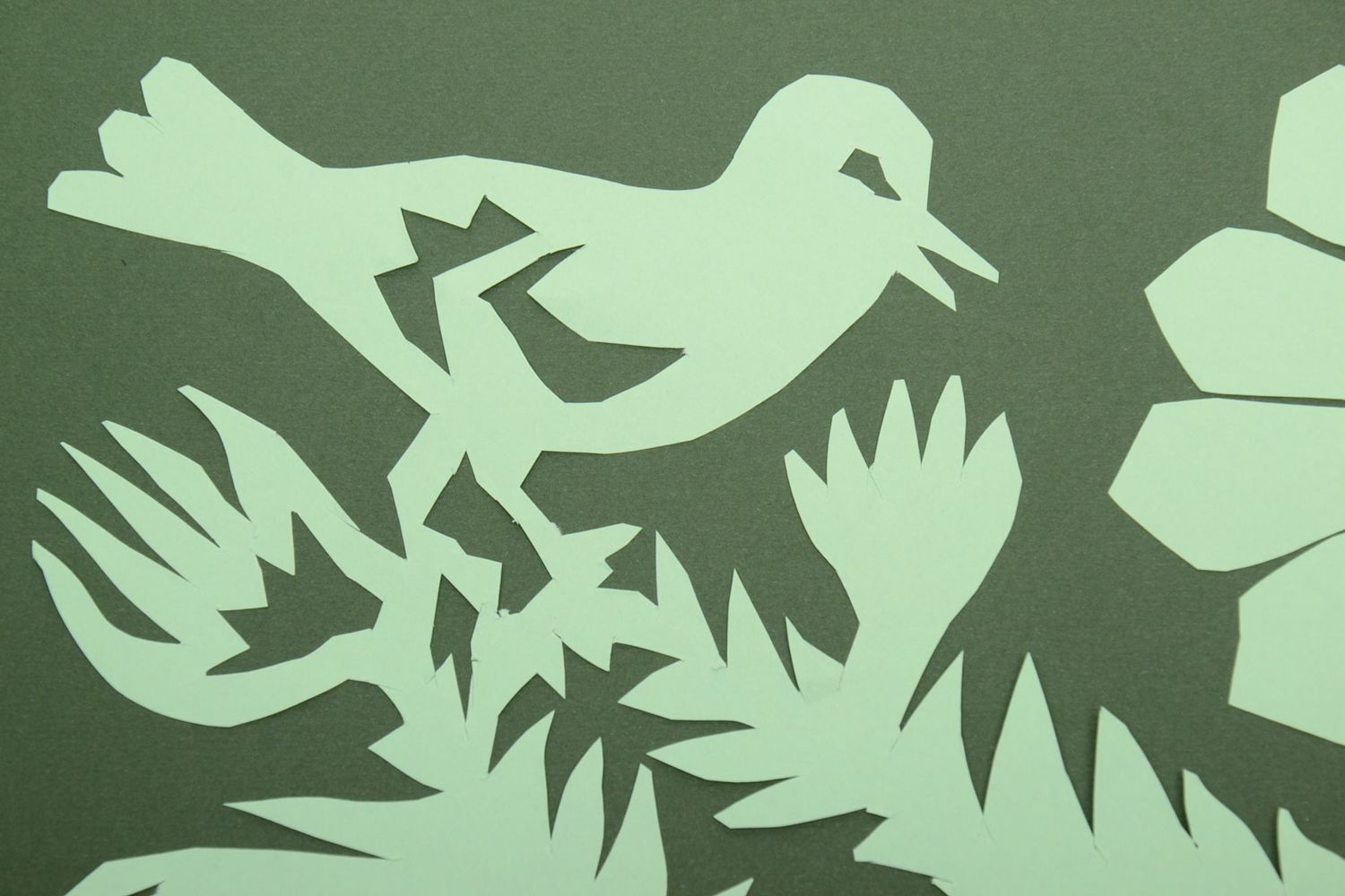 Paper cut out picture on green background Blackthorn photo 4