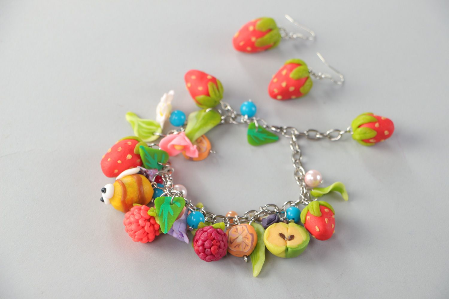 Set of charm jewelry bracelet and earrings with colorful barries for a girl photo 2