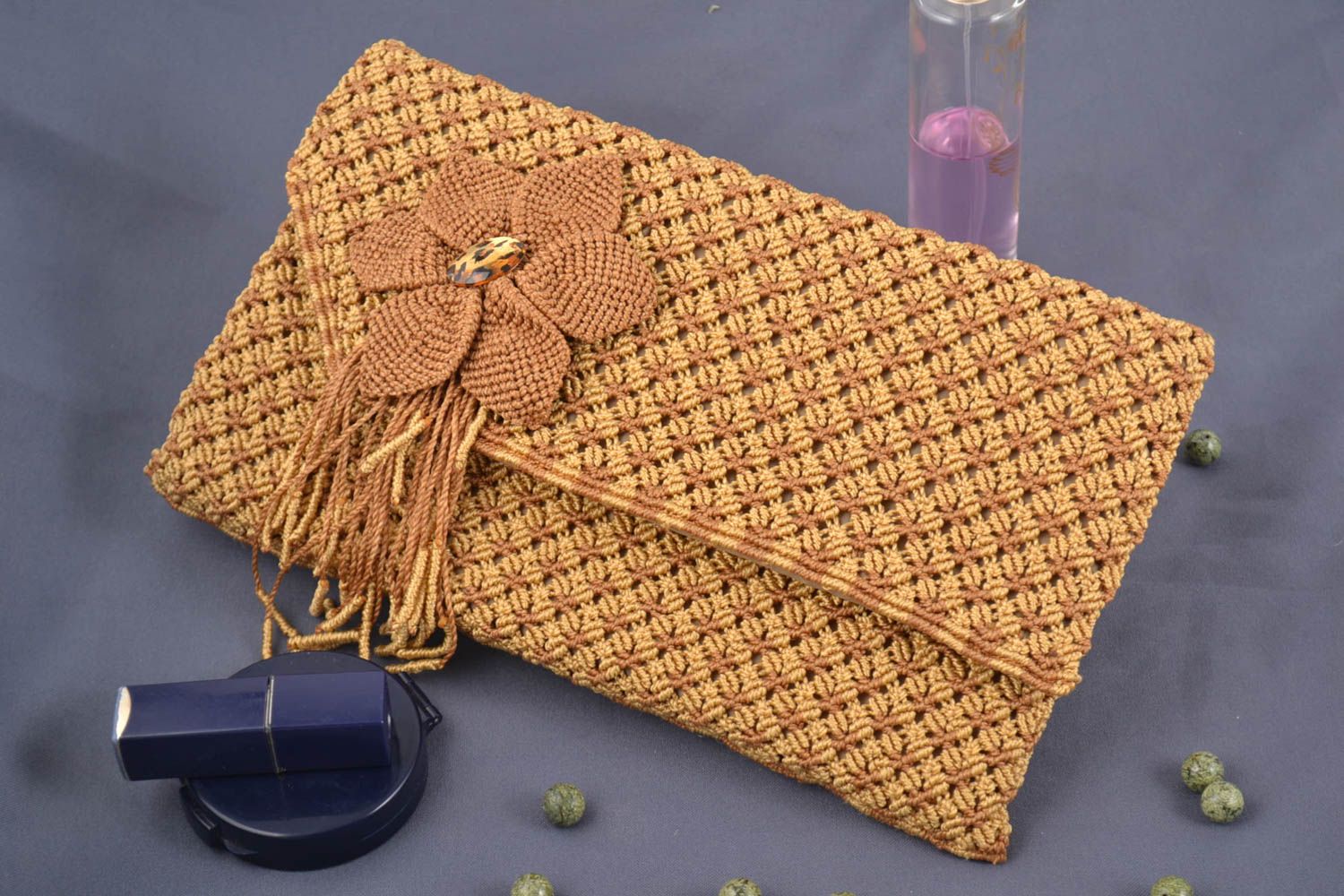 Handmade macrame clutch purse woven of synthetic threads of beige color photo 1