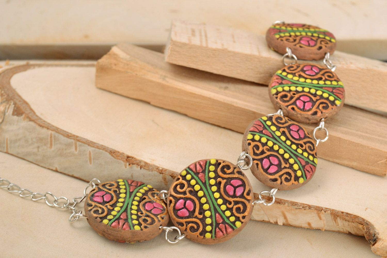 Women's wrist bracelet with brightly painted round ceramic elements handmade photo 1