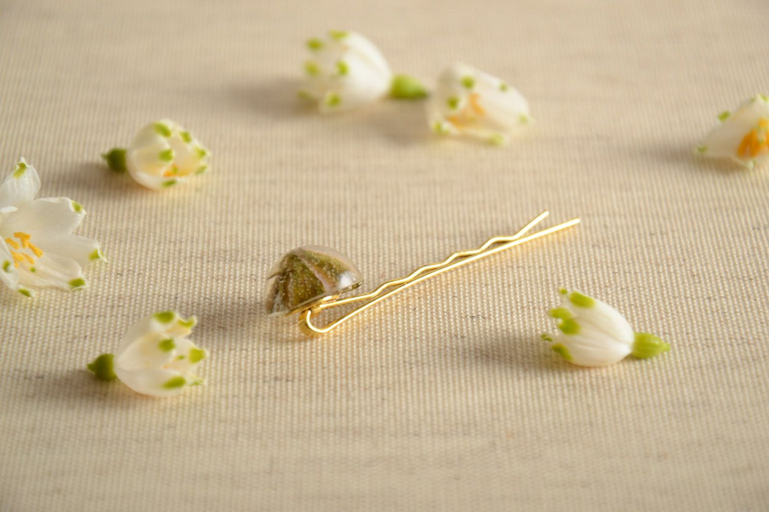 Handmade small hair clip with metal basis and natural plant in epoxy resin photo 1
