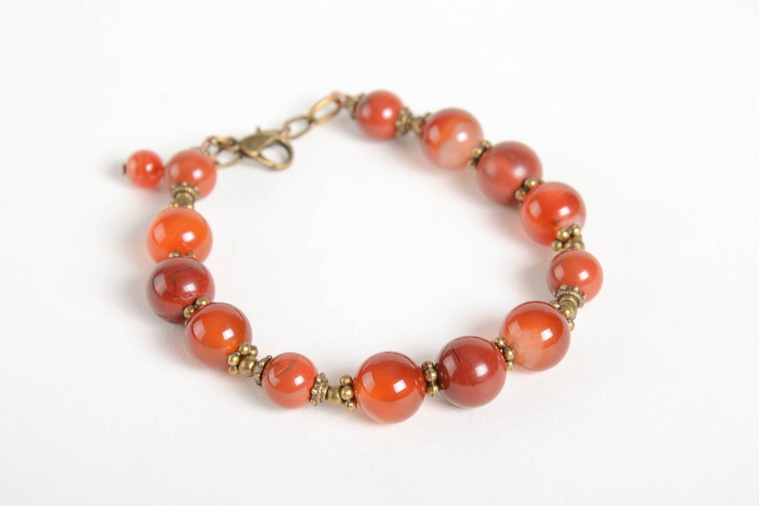 Pale red natural stones beaded adjustable bracelet with bronze charms for girls photo 5