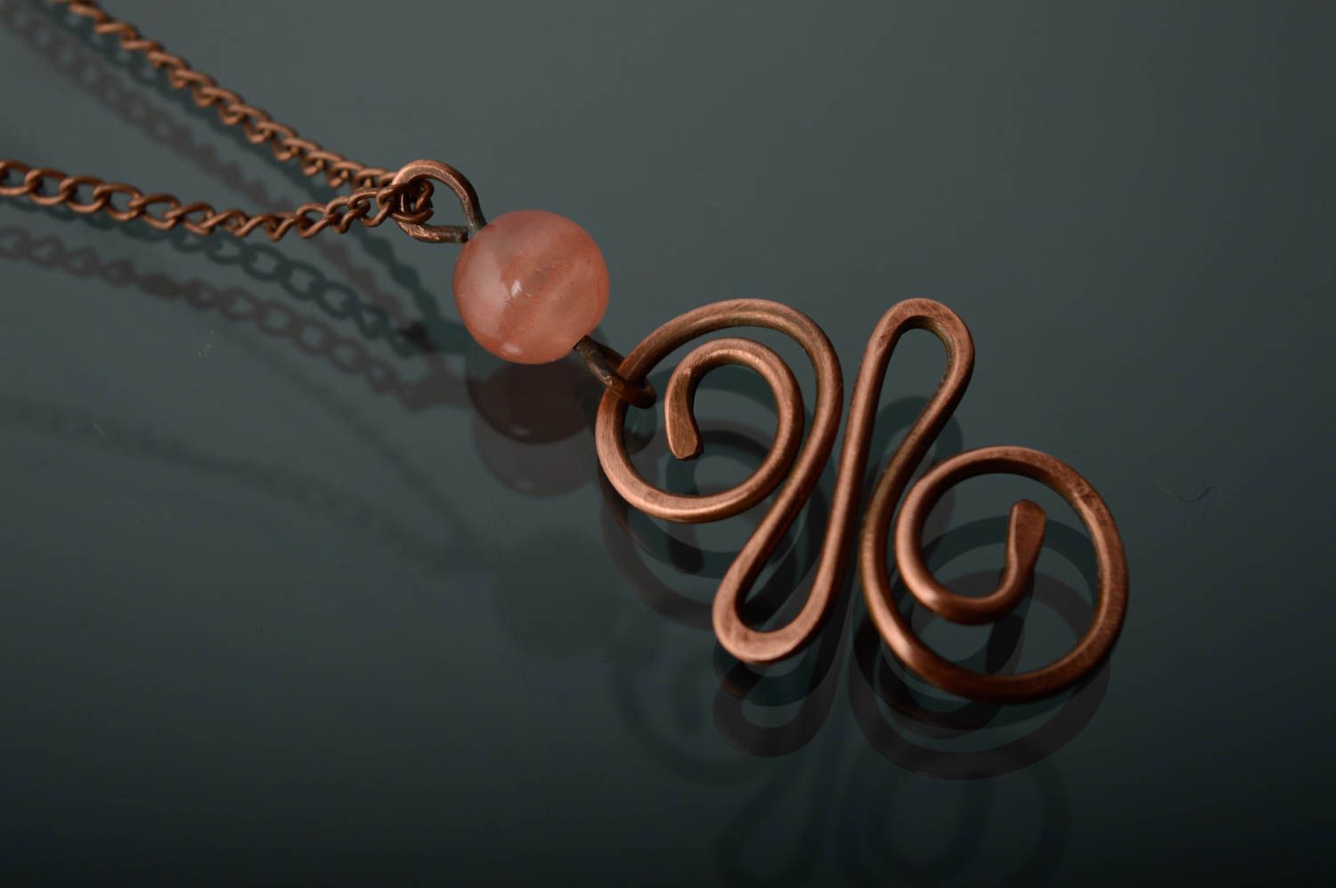 Copper wire pendant with natural onyx photo 1