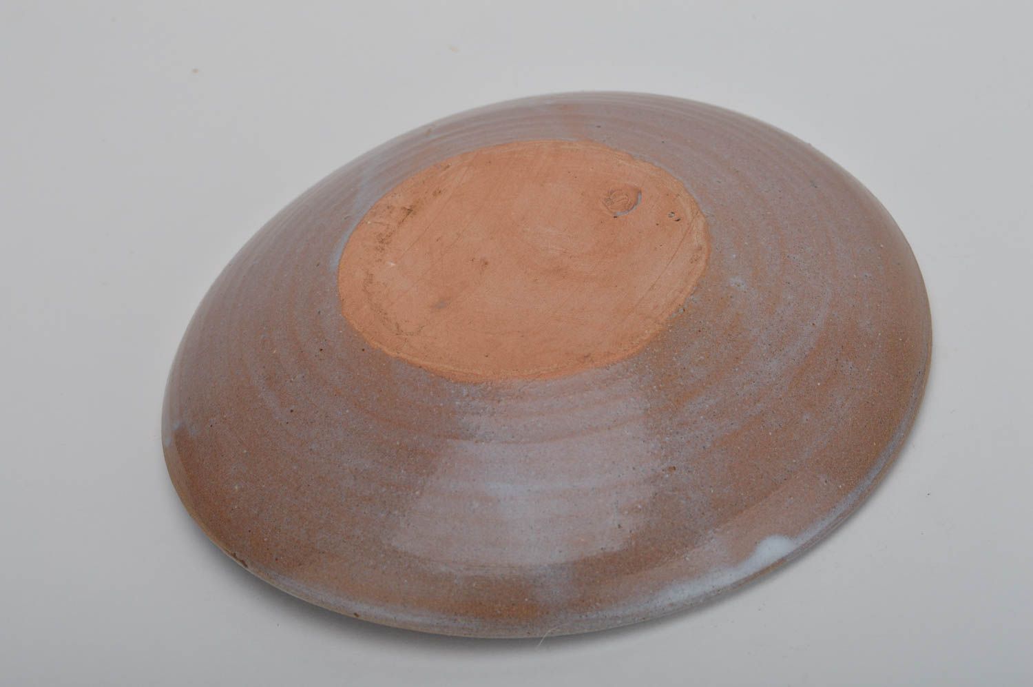 Красивая керамическая тарелка из красной глины с узором для декора Феерверк фото 5