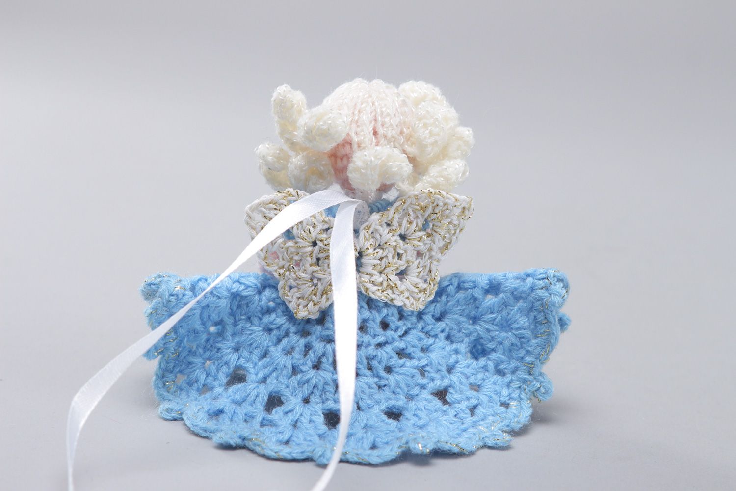 Small handmade soft toy crocheted of cotton and acrylics Girl in blue dress photo 2