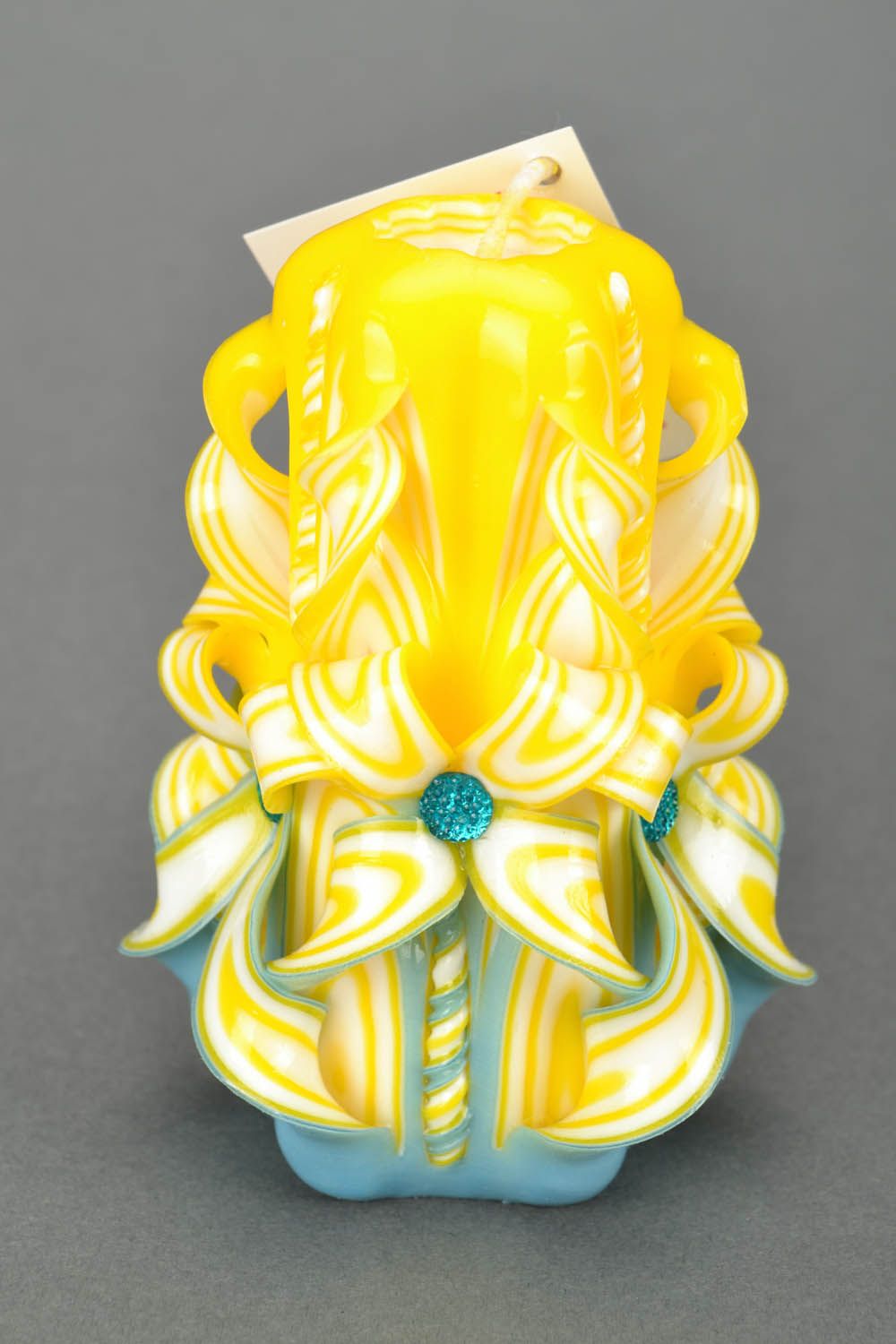Yellow carved candle photo 3