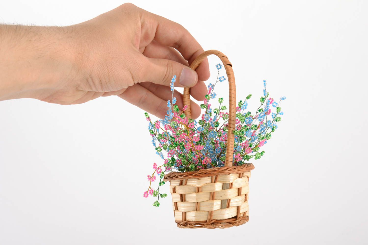 Small basket with handmade bright colorful artificial flowers woven of beads photo 5