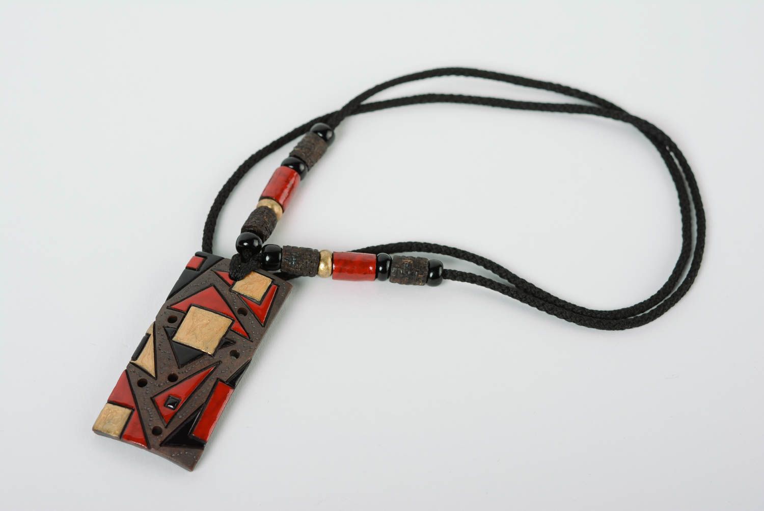 Handcrafted ceramic pendant made of clay with colored enamel paintings photo 1
