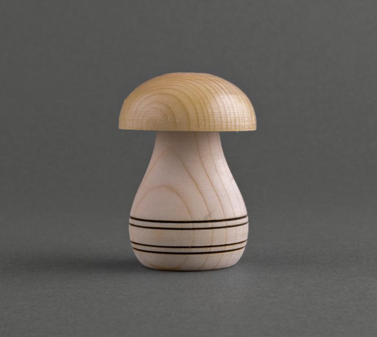 Wooden salt shaker in the shape of a mushroom photo 2