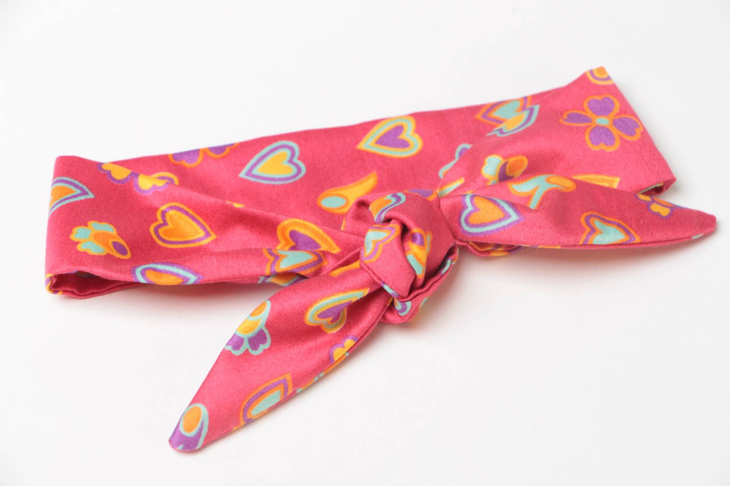 Handmade bright viscose fabric dolly bow headband with hearts pattern photo 3