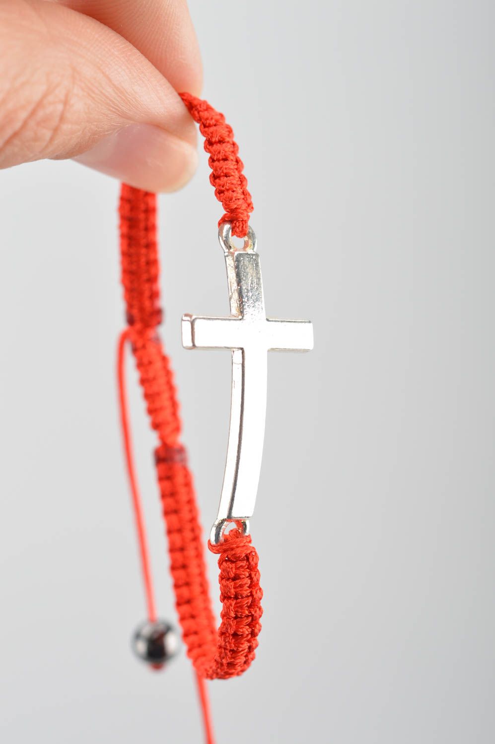 Textile stylish unusual accessory woven wrist bracelet with metal cross photo 3