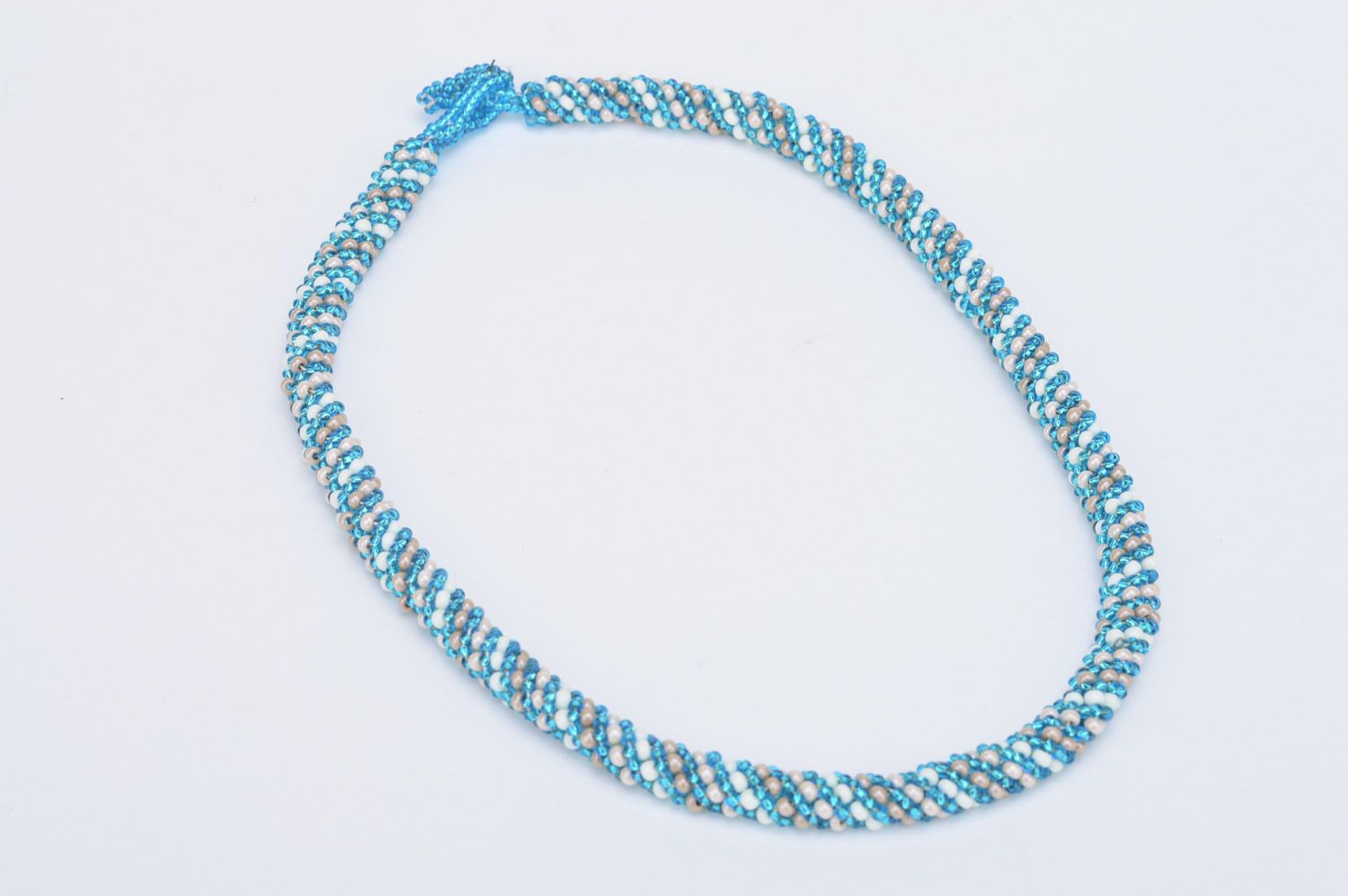 Handmade tender beaded cord necklace in blue and white colors for women photo 2