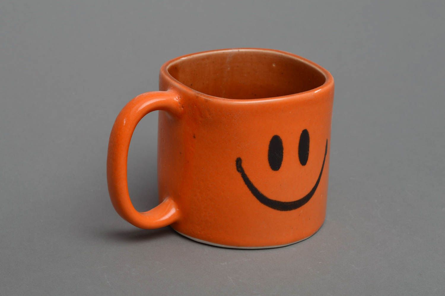 Ceramic cup for coffee in orange color glazed inside with smile face photo 2