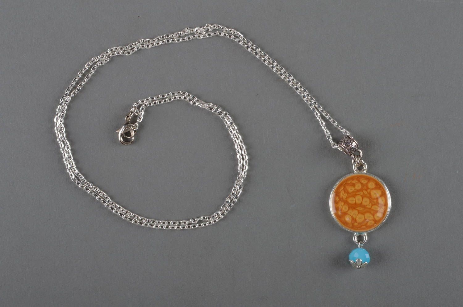 Unusual stylish decoupage handmade round neck pendant coated with epoxy photo 1