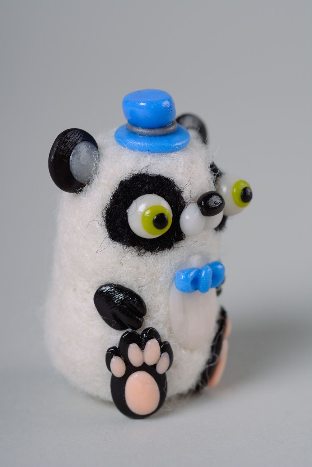 Handmade miniature wool toy panda made using needle felting technique photo 2